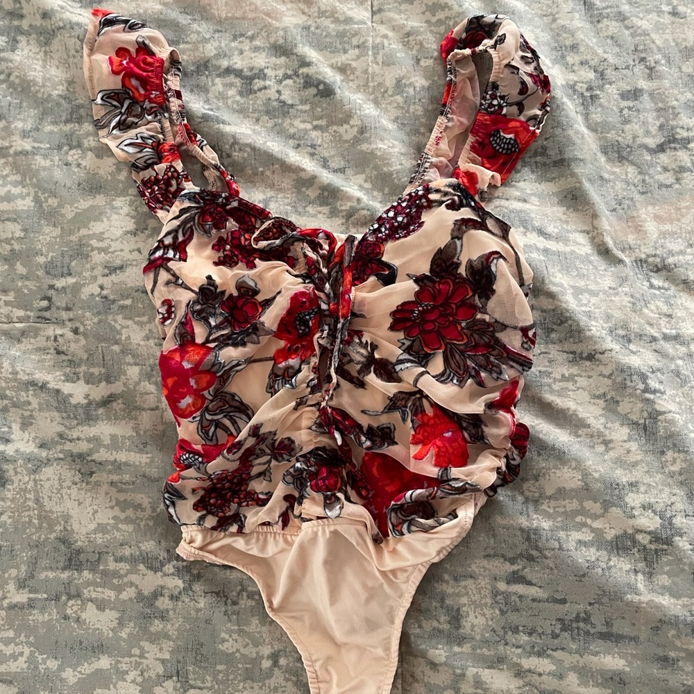 Body suit with front tie